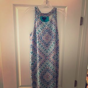 A midi length summer dress (dress is cut off)